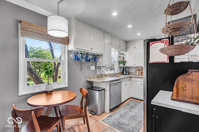 2204 Pamela Dr, Indianapolis, IN 46220 - kitchen featuring white cabinets, a textured ceiling, stainless steel dishwasher, and a sink