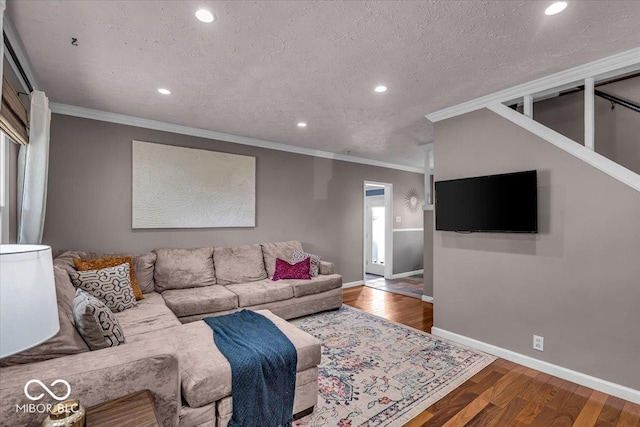 2204 Pamela Dr, Indianapolis, IN 46220 - living area featuring baseboards, wood finished floors, recessed lighting, and ornamental molding
