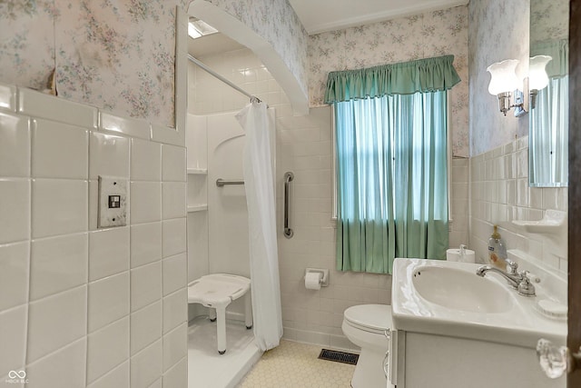 1194 S Faculty Dr, Indianapolis, IN 46241 - full bathroom featuring tile patterned floors, tile walls, and wallpapered walls