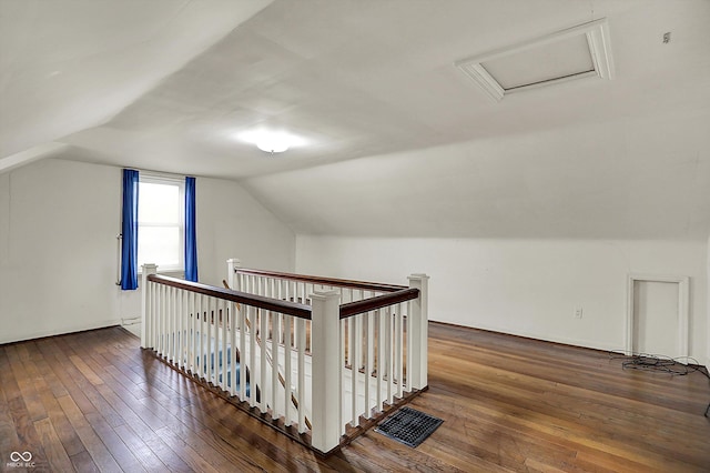 1194 S Faculty Dr, Indianapolis, IN 46241 - bonus room featuring visible vents, attic access, wood-type flooring, and vaulted ceiling