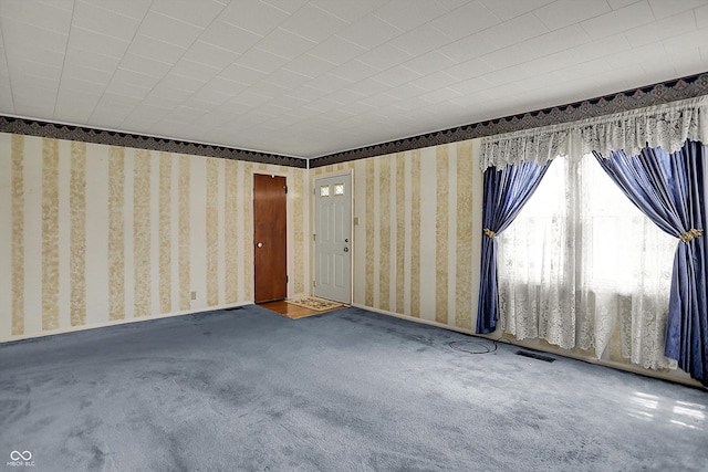 1194 S Faculty Dr, Indianapolis, IN 46241 - carpeted empty room featuring wallpapered walls and visible vents