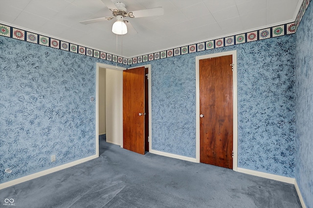 1194 S Faculty Dr, Indianapolis, IN 46241 - carpeted empty room with wallpapered walls, ceiling fan, and baseboards