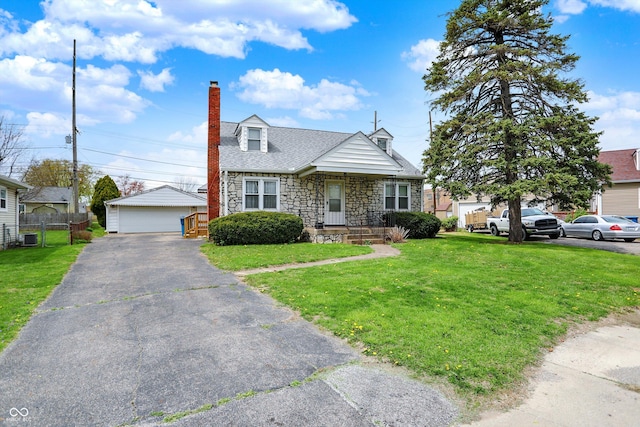 1194 S Faculty Dr, Indianapolis, IN 46241 - view of front facade featuring a front yard, stone siding, a chimney, fence, and an outdoor structure