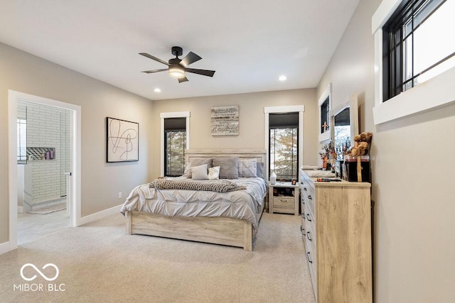 bedroom with ceiling fan, light colored carpet, ensuite bath, recessed lighting, and baseboards