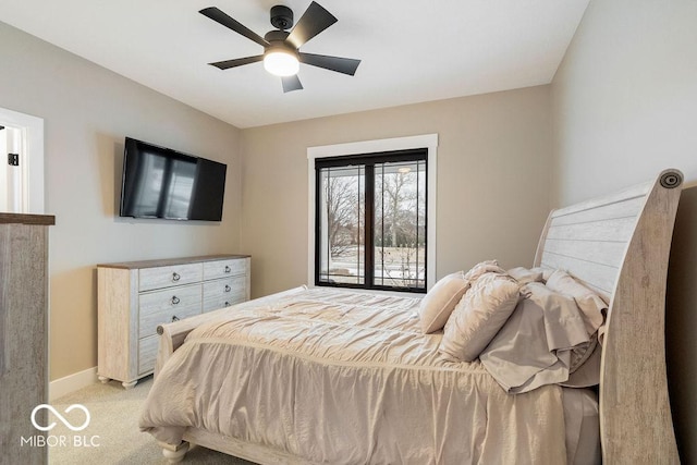 bedroom with baseboards, ceiling fan, and light carpet