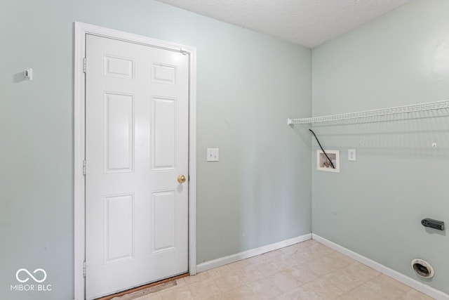 5817 Thompson Park Blvd, Indianapolis, IN 46237 - clothes washing area featuring laundry area, a textured ceiling, washer hookup, hookup for an electric dryer, and baseboards