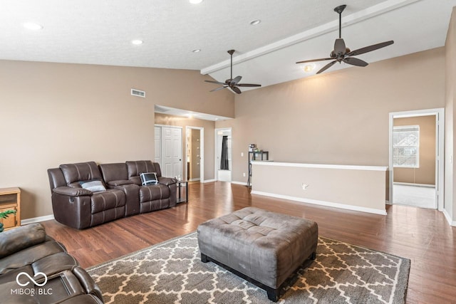 5817 Thompson Park Blvd, Indianapolis, IN 46237 - living area featuring beamed ceiling, a ceiling fan, visible vents, wood finished floors, and baseboards