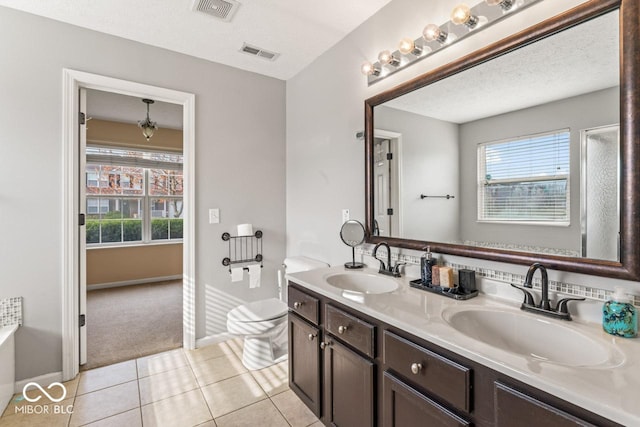 5817 Thompson Park Blvd, Indianapolis, IN 46237 - full bath featuring a sink, tile patterned flooring, and visible vents