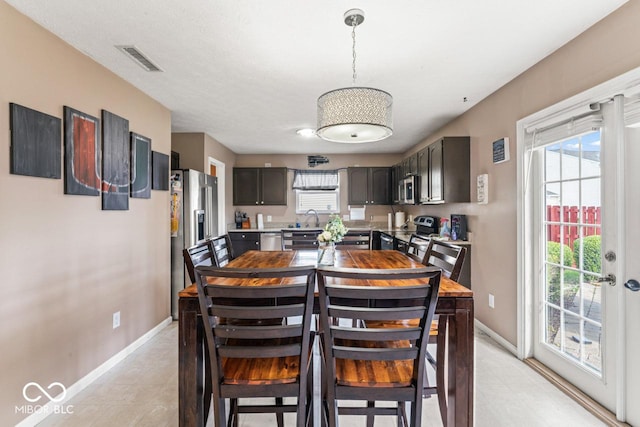 5817 Thompson Park Blvd, Indianapolis, IN 46237 - dining space with visible vents and baseboards