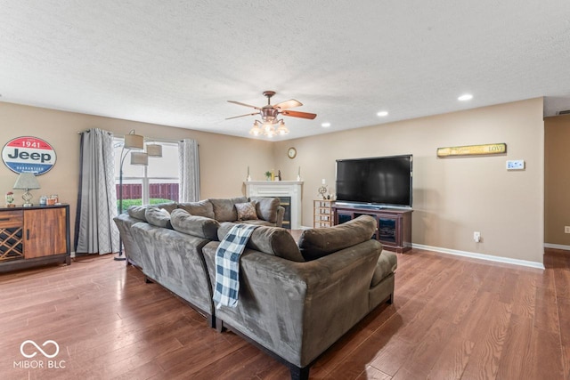5817 Thompson Park Blvd, Indianapolis, IN 46237 - living room featuring baseboards, recessed lighting, a textured ceiling, ceiling fan, and wood finished floors