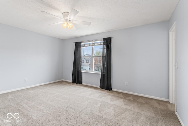 5817 Thompson Park Blvd, Indianapolis, IN 46237 - carpeted spare room featuring ceiling fan, baseboards, and a textured ceiling