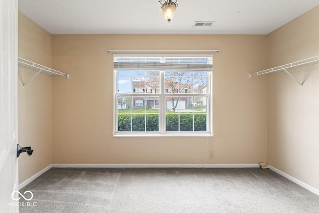 5817 Thompson Park Blvd, Indianapolis, IN 46237 - walk in closet featuring visible vents and carpet floors