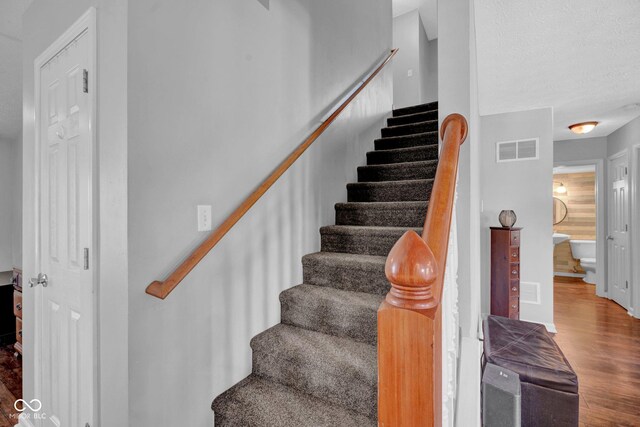 1280 Summer Ridge Ln, Brownsburg, IN 46112 - stairs with wood finished floors and baseboards