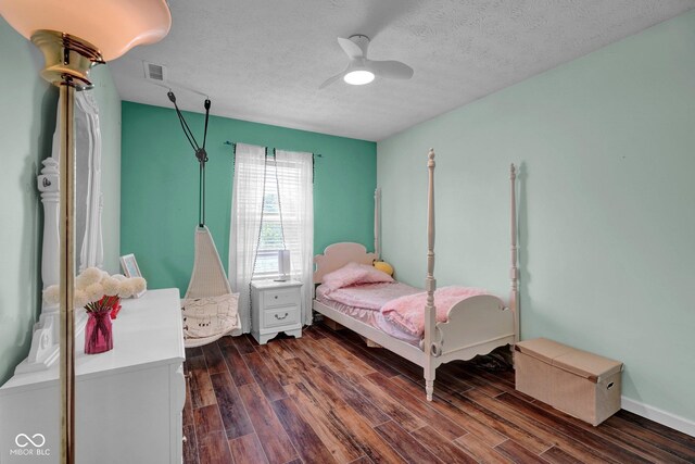 1280 Summer Ridge Ln, Brownsburg, IN 46112 - bedroom with dark wood-type flooring, ceiling fan, and a textured ceiling
