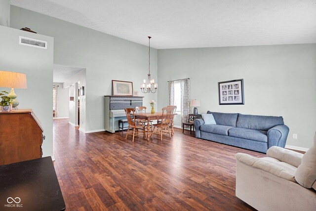 1280 Summer Ridge Ln, Brownsburg, IN 46112 - living area featuring wood finished floors, a chandelier, and high vaulted ceiling