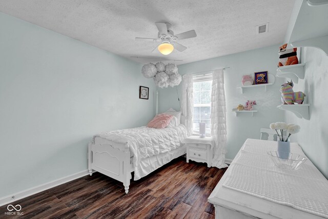 1280 Summer Ridge Ln, Brownsburg, IN 46112 - bedroom with wood finished floors, a textured ceiling, and a ceiling fan