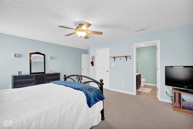 1280 Summer Ridge Ln, Brownsburg, IN 46112 - bedroom with a textured ceiling, carpet flooring, a ceiling fan, and ensuite bath