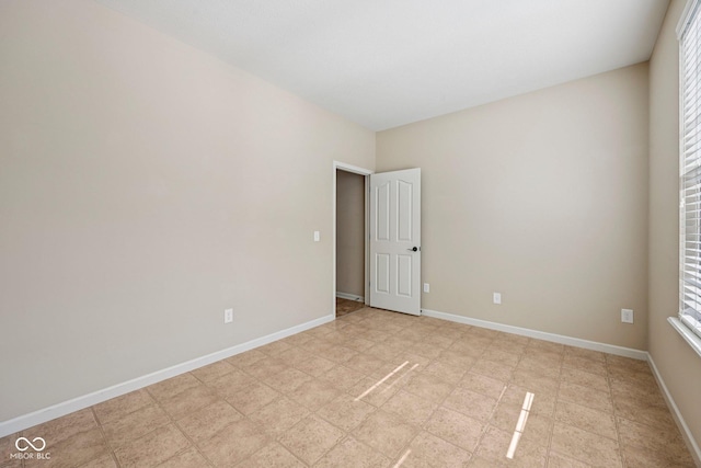 12907 Shiraz Ln, Fishers, IN 46037 - unfurnished room with baseboards and plenty of natural light