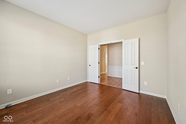 12907 Shiraz Ln, Fishers, IN 46037 - empty room featuring wood finished floors and baseboards