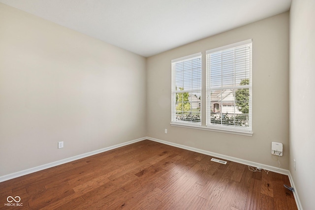 12907 Shiraz Ln, Fishers, IN 46037 - unfurnished room with baseboards and wood finished floors