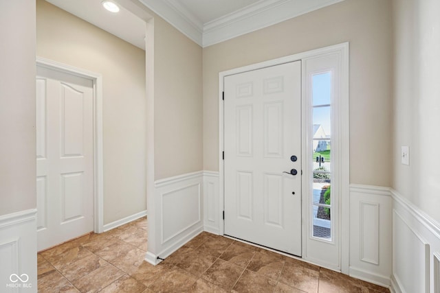 12907 Shiraz Ln, Fishers, IN 46037 - entrance foyer with a wainscoted wall, ornamental molding, and a decorative wall