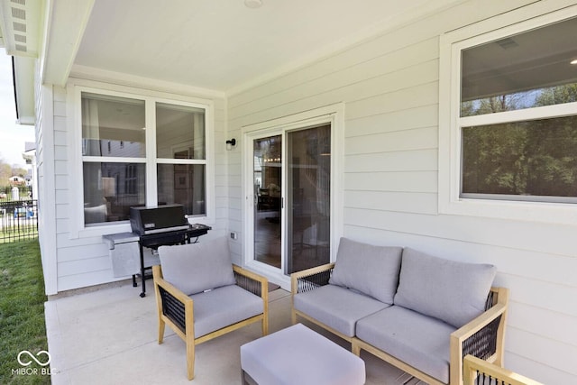 view of patio featuring fence, an outdoor hangout area, and area for grilling