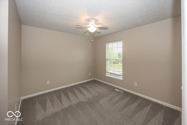 11648 Stickney Ct, Fishers, IN 46037 - carpeted spare room with baseboards, ceiling fan, and a textured ceiling