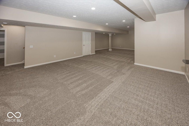 11648 Stickney Ct, Fishers, IN 46037 - finished below grade area with carpet, baseboards, recessed lighting, and a textured ceiling