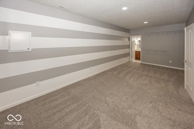 11648 Stickney Ct, Fishers, IN 46037 - carpeted spare room featuring recessed lighting, baseboards, and a textured ceiling