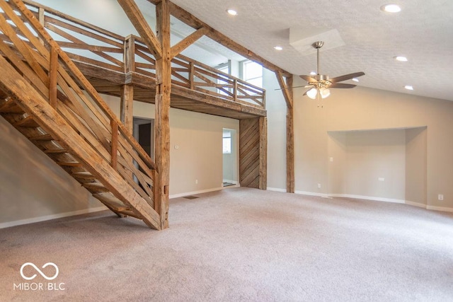 7748 S State Road 39, Clayton, IN 46118 - unfurnished living room featuring baseboards, recessed lighting, carpet, and high vaulted ceiling