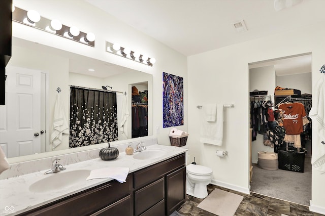 950 Redwood Dr, Franklin, IN 46131 - full bathroom with double vanity, a walk in closet, and a shower with curtain