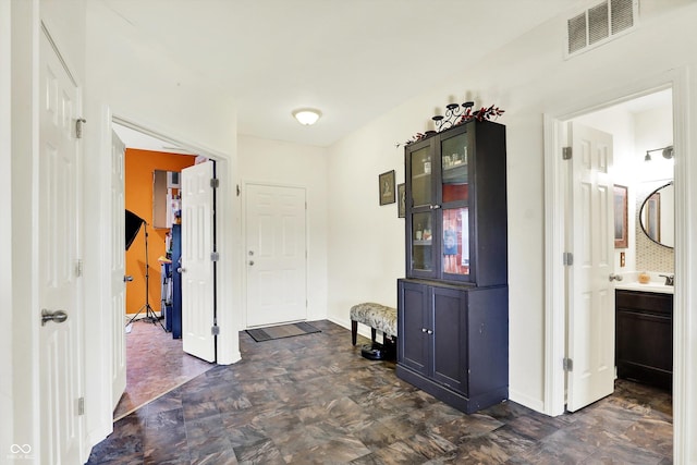 950 Redwood Dr, Franklin, IN 46131 - hallway featuring baseboards and a sink