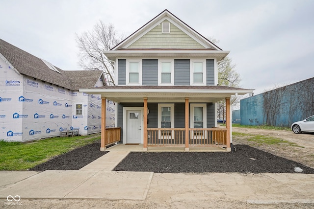 view of front of home featuring covered porch