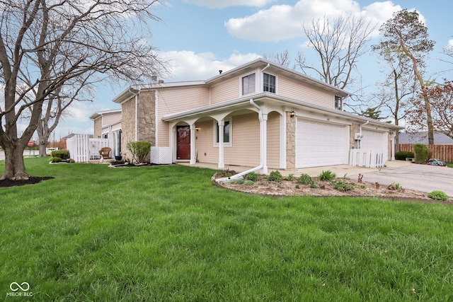 traditional-style house with concrete driveway, stone siding, fence, and a front lawn