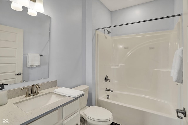 bathroom featuring shower / bath combination, toilet, and vanity