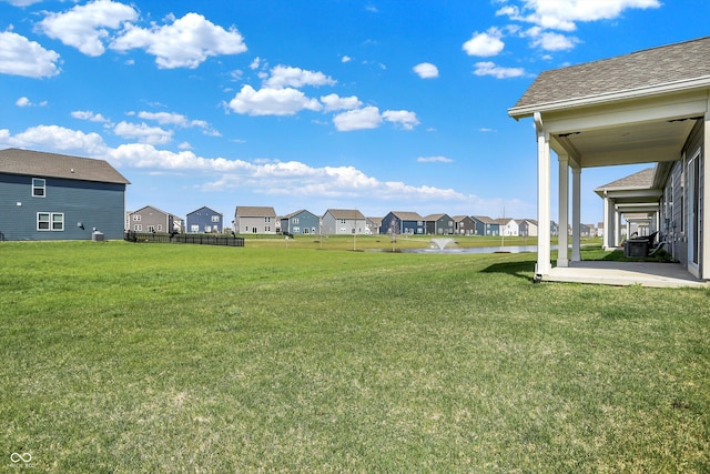 view of yard featuring a residential view