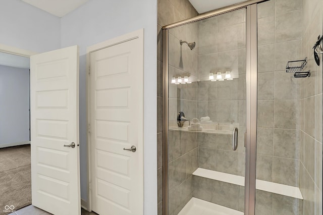 bathroom featuring a shower stall