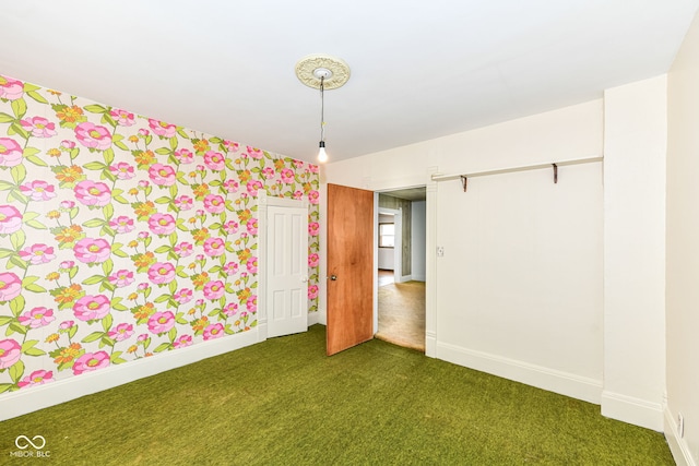 2001 S I St, Elwood, IN 46036 - carpeted empty room featuring wallpapered walls and baseboards