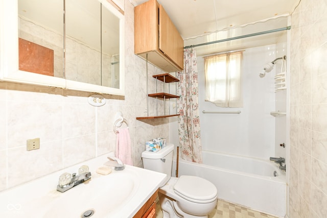 2001 S I St, Elwood, IN 46036 - full bathroom featuring tile walls, vanity, shower / tub combo, and toilet