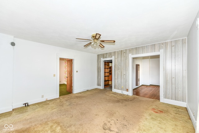 2001 S I St, Elwood, IN 46036 - unfurnished bedroom with a ceiling fan, baseboards, and carpet floors