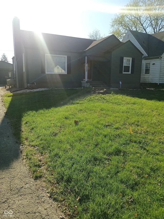 exterior space featuring a front lawn