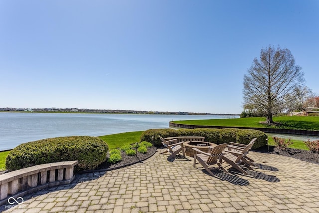 290 Breakwater Dr, Fishers, IN 46037 - view of patio with a fire pit and a water view