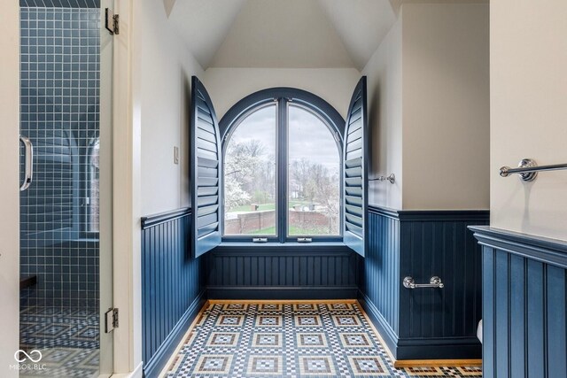 290 Breakwater Dr, Fishers, IN 46037 - bathroom featuring wainscoting and a shower stall