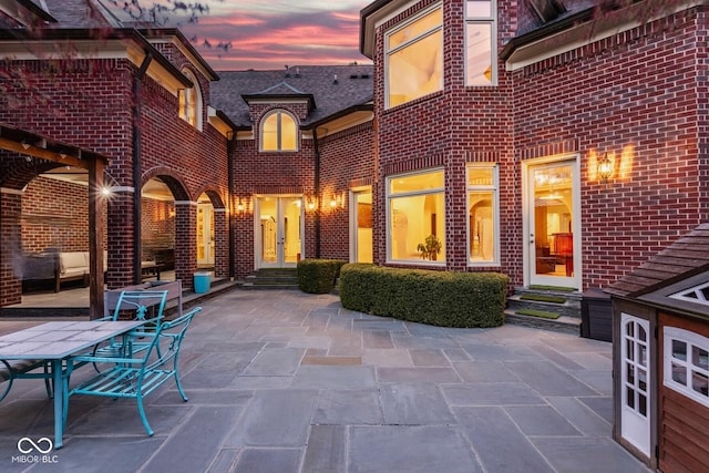290 Breakwater Dr, Fishers, IN 46037 - patio terrace at dusk featuring entry steps