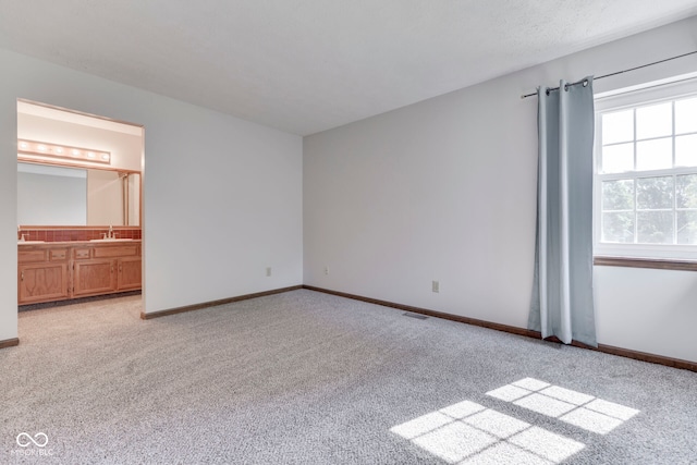 8160 Bold Forbes Ct, Indianapolis, IN 46217 - unfurnished bedroom with light carpet and ensuite bath