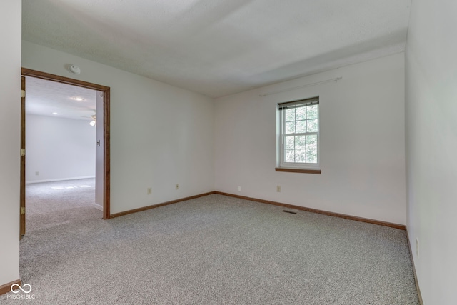8160 Bold Forbes Ct, Indianapolis, IN 46217 - carpeted spare room featuring baseboards and a smoke detector