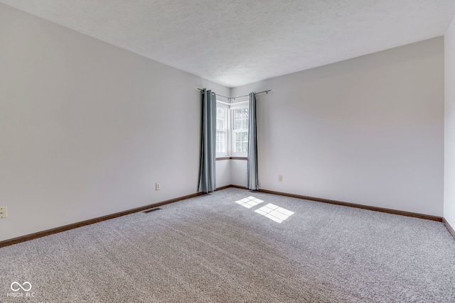 8160 Bold Forbes Ct, Indianapolis, IN 46217 - unfurnished room with carpet and a textured ceiling