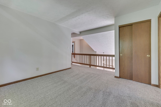 8160 Bold Forbes Ct, Indianapolis, IN 46217 - carpeted empty room with baseboards and a textured ceiling