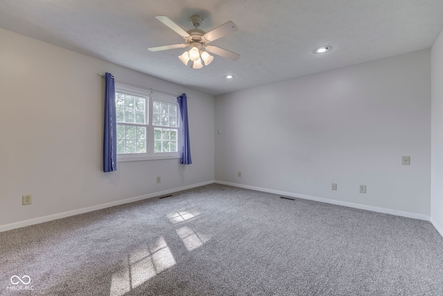 8160 Bold Forbes Ct, Indianapolis, IN 46217 - empty room featuring carpet floors, ceiling fan, and recessed lighting