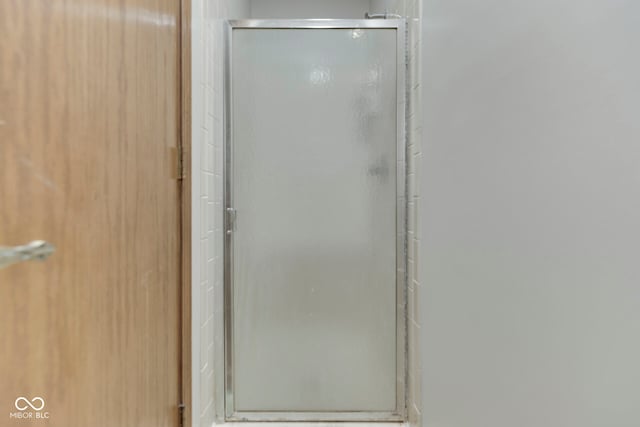 8160 Bold Forbes Ct, Indianapolis, IN 46217 - bathroom with a stall shower